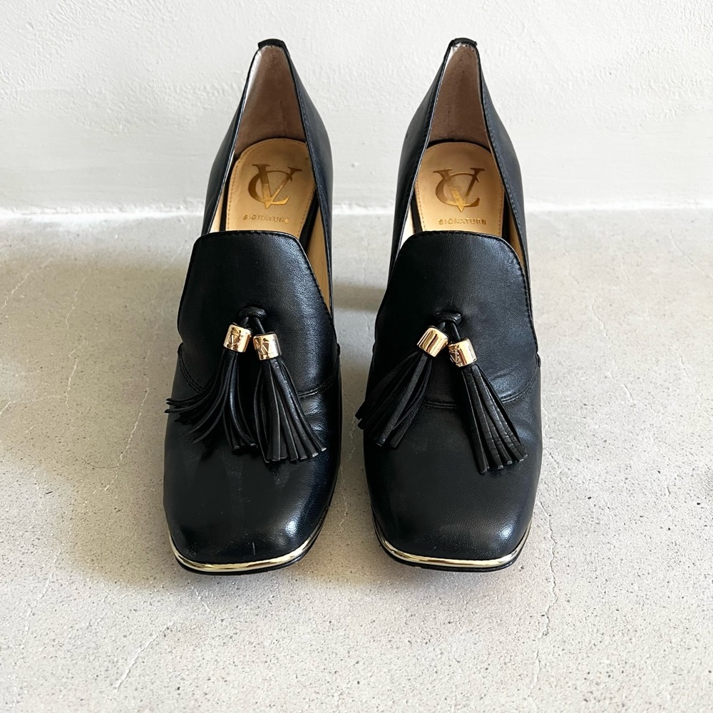 VINCE CAMUTO black leather heeled loader with tassels and gold accents size 9